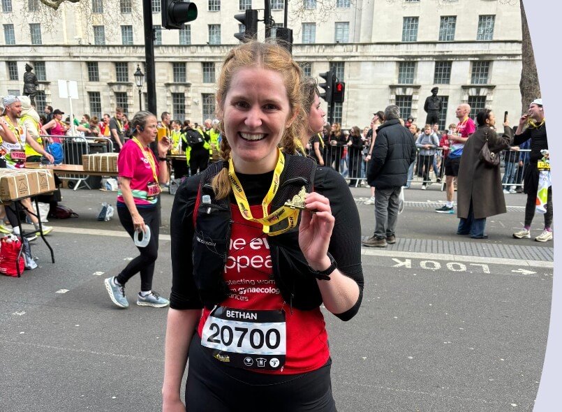 Image on London Landmarks Half Marathon page. Image of a runner wearing a The Eve Appeal running vest.