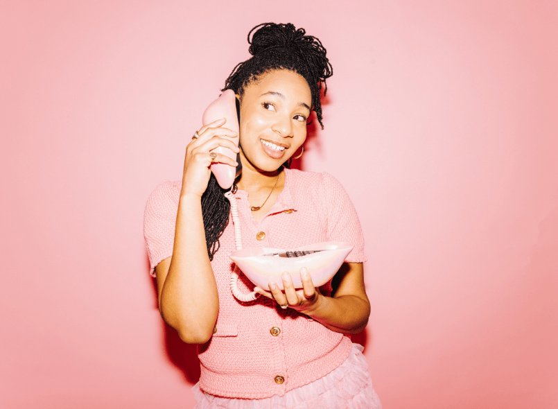 Picture of Shalisha holding a phone to her ear