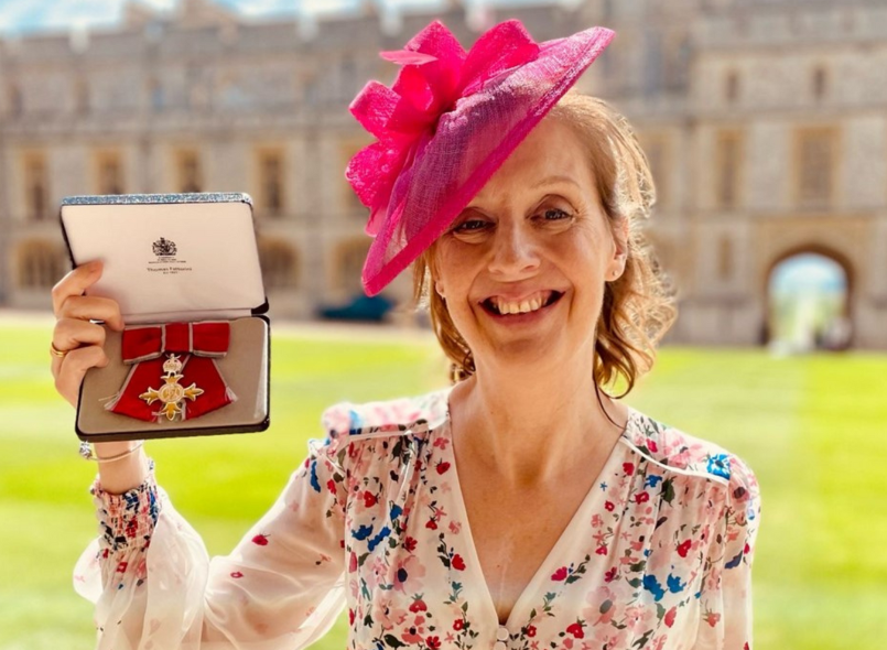 Photo of Helen with her MBE
