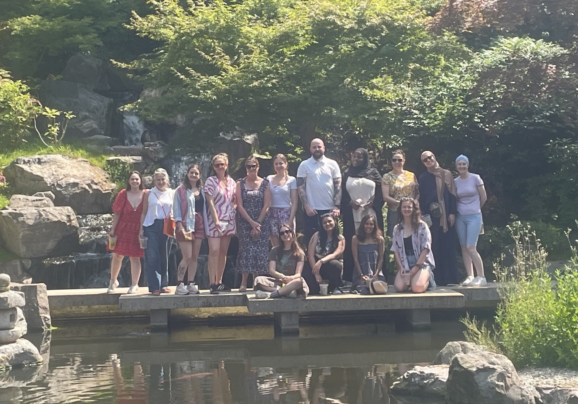 a photo of some of our staff outside in a park